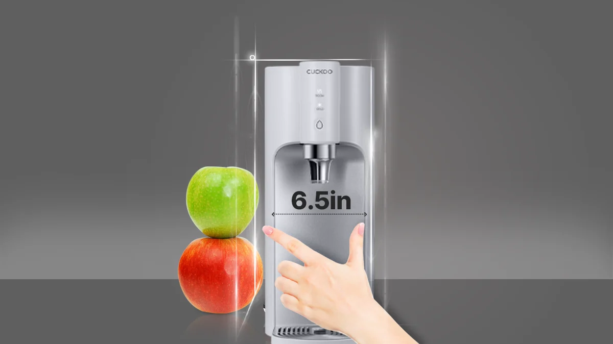 CUCKOO TN102 water purifier showing a slim 6.5-inch width compared next to stacked 2 apples for scale. (cp-tn102)