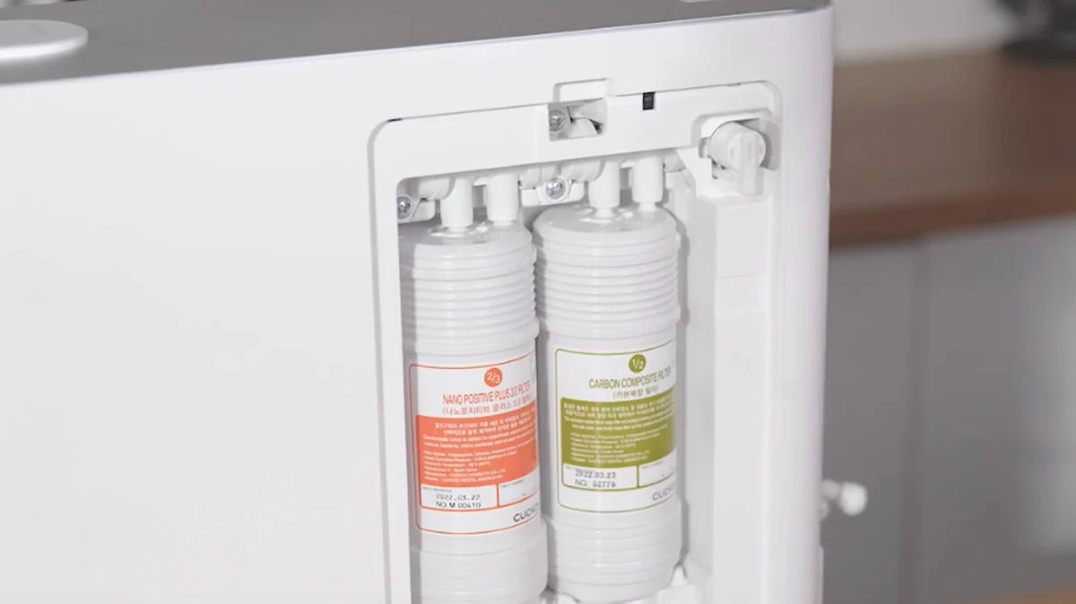 CUCKOO TN102 Water Purifier showing the back compartment with two installed replacement filters labeled orange and green. (cp-tn102)