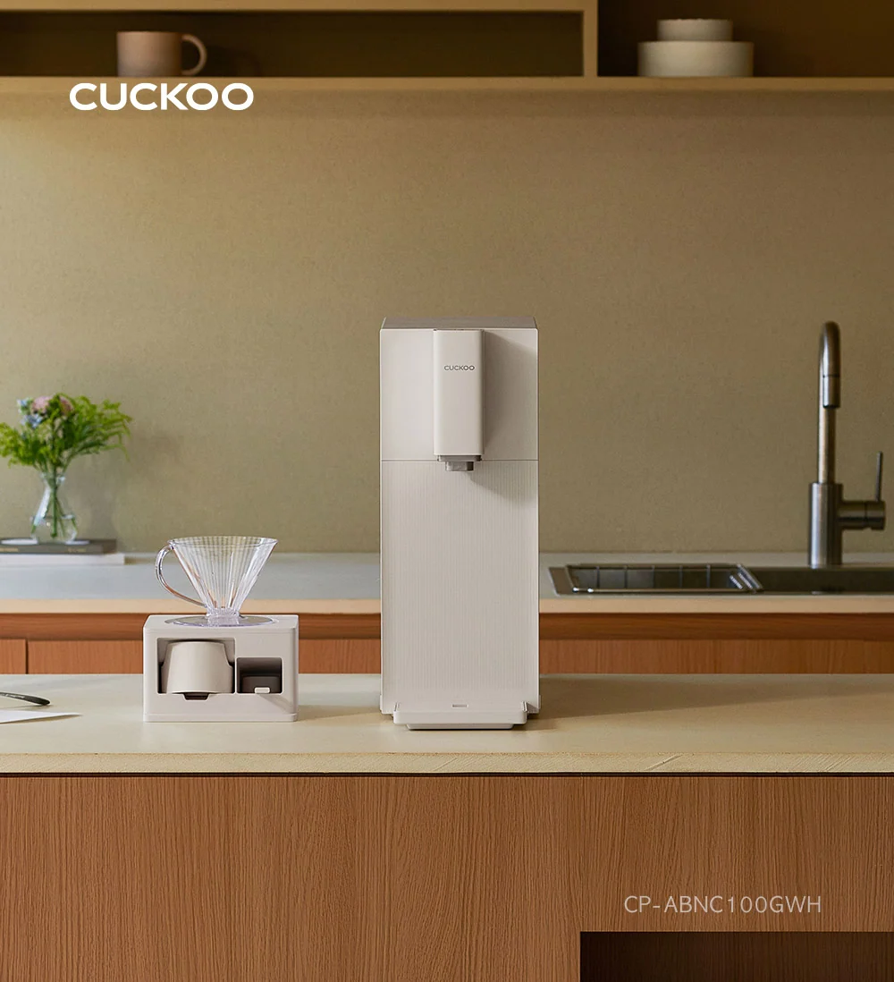 Steam 100 Barista water purifier on kitchen counter with coffee station, and text: Finally, a perfectly completed home café. (cp-abnc100)